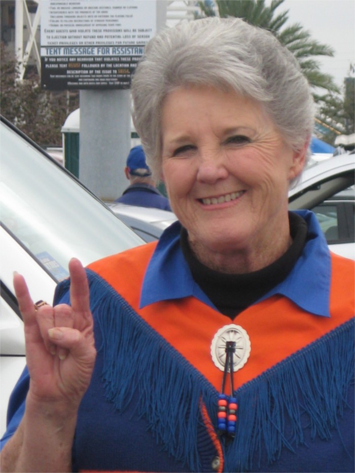 Ann and Hook Em Horns Texas Gator fan photo by Kathy Miller