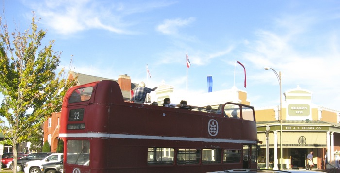 Red double decker bus Ole Miss Oxford Square Mississippi photo by Kathy Miller