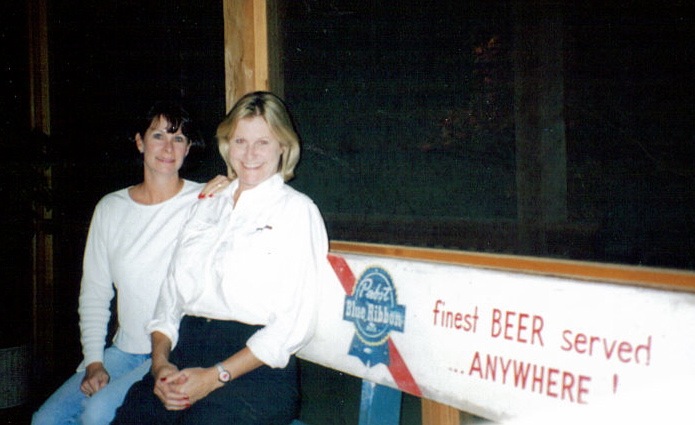 Robin & Kathy on the PBR bench on screened in porch photo by Kathy Miller