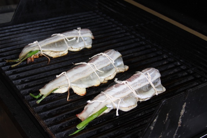 Bacon wrapped grilled Local Rainbow Trout photo by Kathy Miller