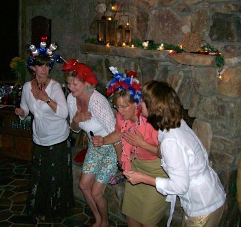 Robin, Kathy, Mary Palmer and Lisa create their own fireworks photo by Kathy Miller