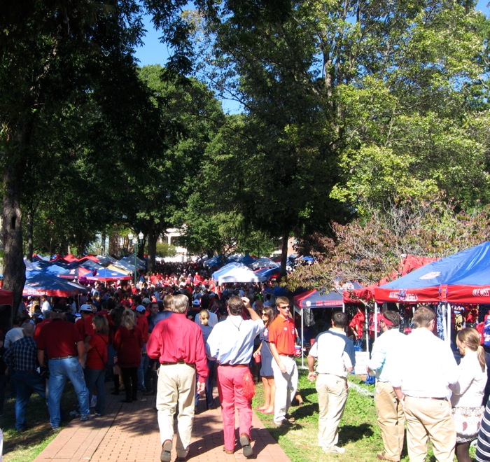 Sea of red & blue tents at Ole Miss The Grove guys in khakis photo by Kathy Miller