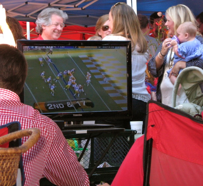 Tailgating at Ole Miss Tennessee Lsu game on tv at tailgate in the Grove photo by Kathy Miller