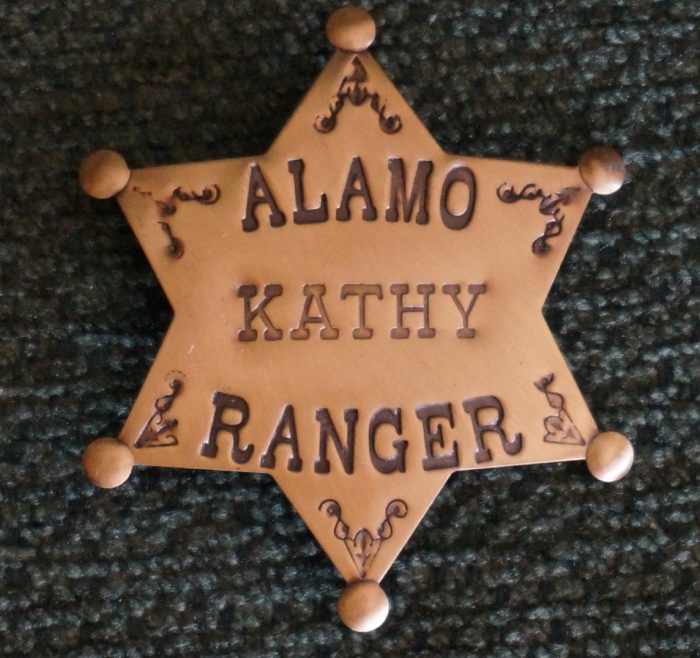 Alamo Kathy Ranger sheriff's badge for the Texas A&M game photo by Kathy Miller