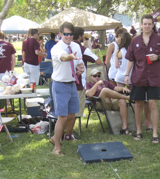 Gator James and Aggie cornhole photo by Kathy Miller