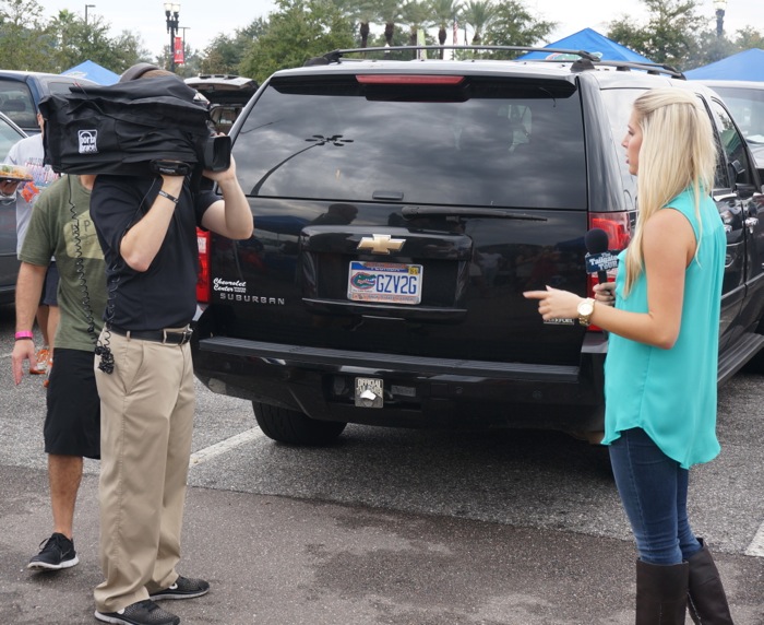 Kelly Hawkins & tailgating segment photo by Kathy Miller