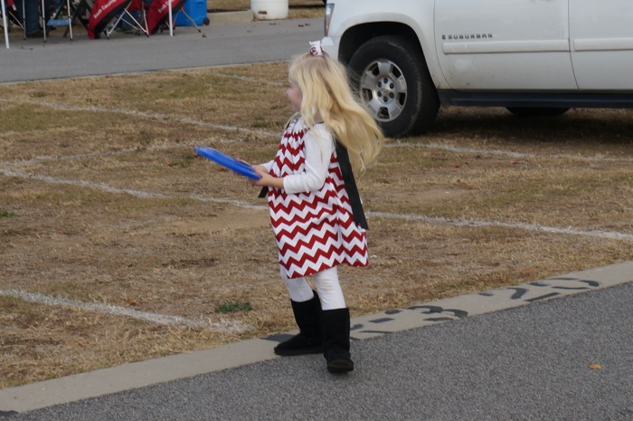 Young Carolia fan with frisbee photo by Kathy Miller