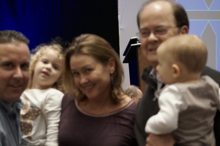 Coach Cutcliffe with family members photo by Kathy Miller