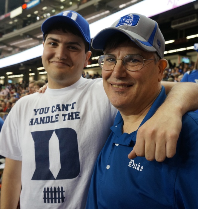 Steven & Dean enjoying their first bowl game ever photo by Kathy Miller