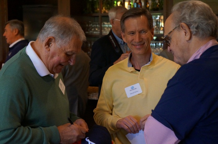 Bobby Cox signing Braves cap for Bill Frank photo by Kathy Miller