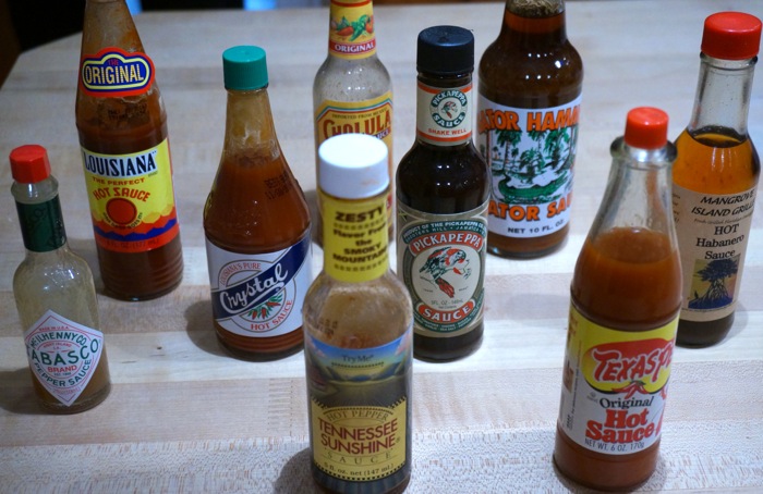 Favorite Hot Sauces, Tabasco, Louisiana Hot Sauce, Tennessee Sunshine, Crystal, Texas Pete photo by Kathy Miller