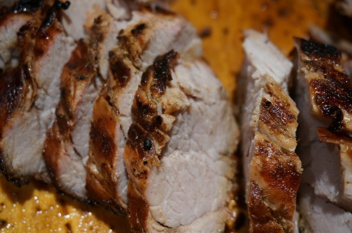 Grilled Pork Tenderloin marinated in mustard based BBQ sauce photo by Kathy Miller