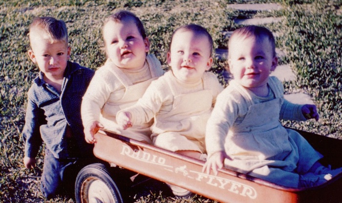 Dave with triplets photo by Kathy Miller