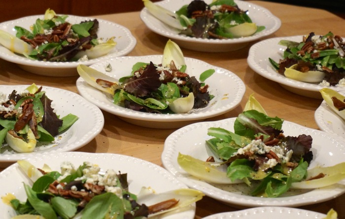 Mixed Greens with Endive, Dates, Pecans,  and Crumbled Goat Cheese with a Shallot Infused Vinaigrette photo by Kathy Miller