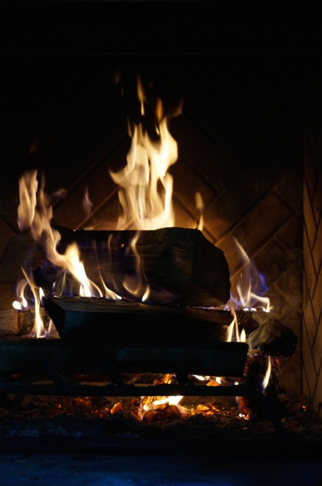 A roaring fire on the screened porch photo by Kathy Miller