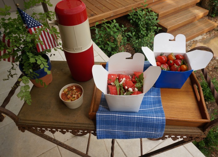 Portable 4th of July meal or tailgate with red, white, and blue take-out boxes photo by Kathy Miller