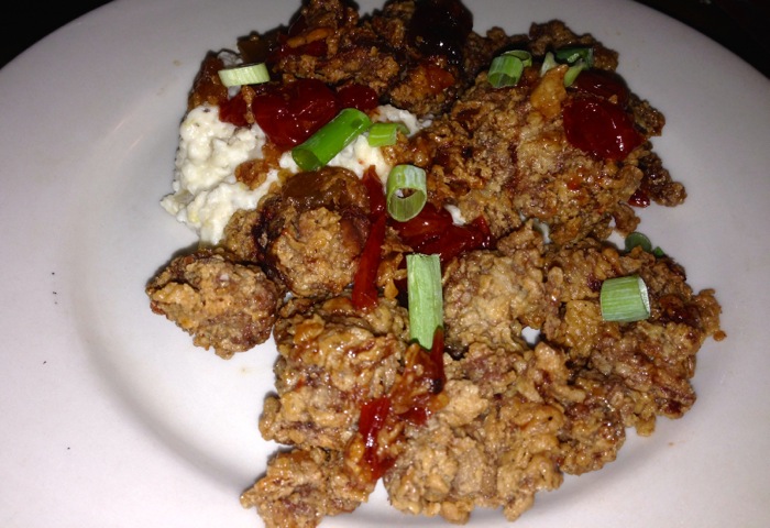 Fried Chicken Livers on a Bed of Grits with Tomato Jam and Green onions from Copper Cellar photo by Kathy Miller