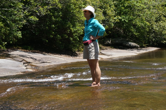 Carson wading and looking at Granny Burrell Falls photo by Kathy Miller