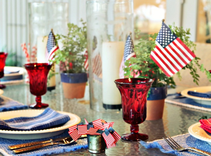 4th of July table with flags styled by Kathy Miller Photo by Susan Scarborough