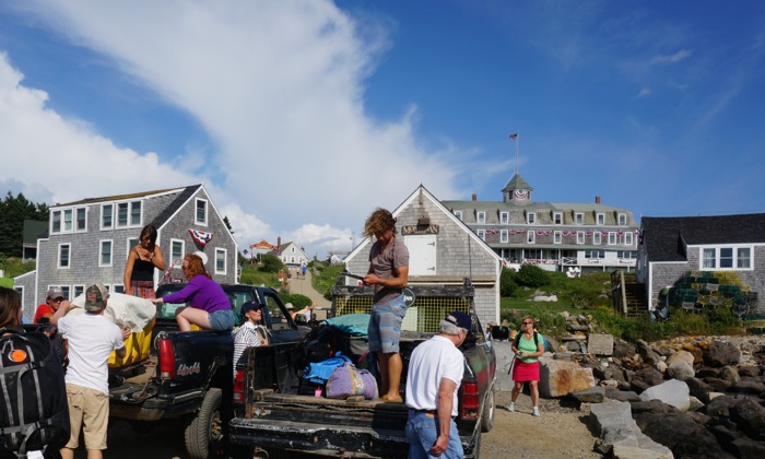 Trucks waiting to take luggage to Island Inn, Monhegan Maine photo by Kathy Miller
