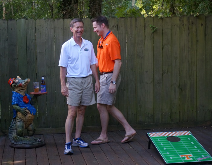 Dave and James playing corn hole photo by Kathy Miller