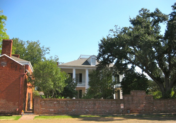 view from rear portico and detached kitchen/dependency photo by Kathy Miller