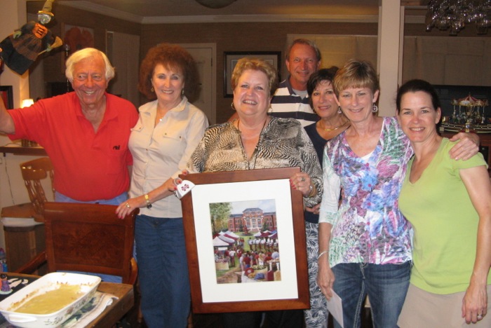 Carol with her Mississippi State print by Kathy Miller photo by Kathy Miller