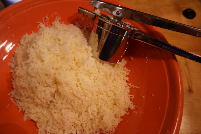Using a Ricer to get lump less mashed potatoes photo by Kathy Miller
