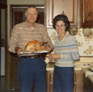 Dad and Mom, Jim and Uhlma Lovett with Thanksgiving Turkey photo by Kathy Miller