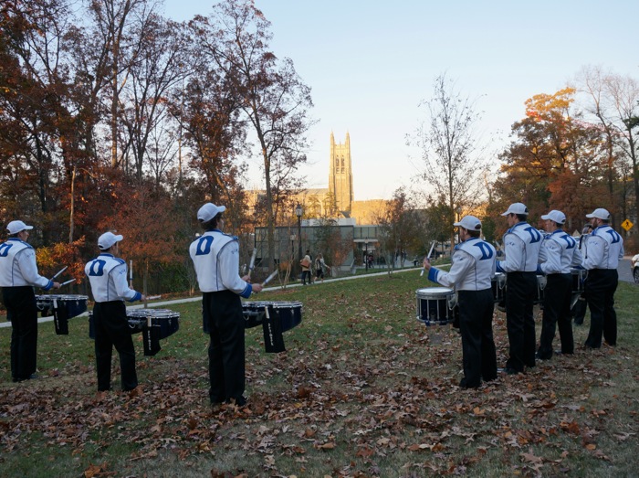 Duike Drummers with setting sun on Duke Chapel photo by Kathy Miller