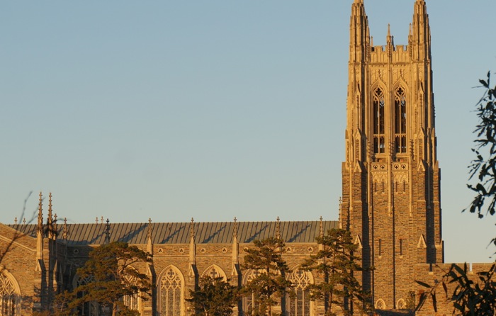 Setting sun on Duke Chapel photo by Kathy Miller