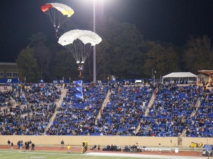 The All Veteran Parachute Team lands a Duke's Wallace Wade Stadium halftime of Duke/UNC game photo by Kathy Miller