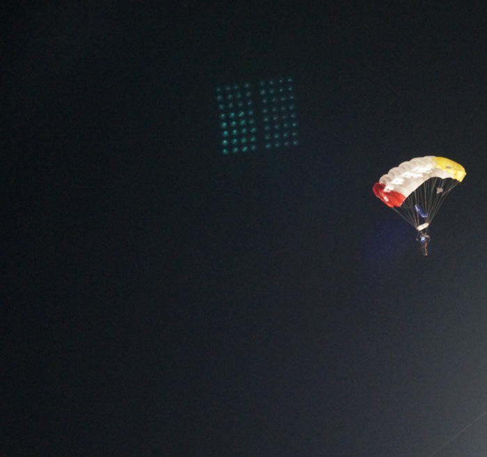 Final Parachutist floats over Wallace Wade Stadium photo by Kathy Miller