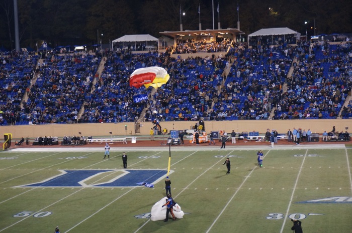 The All Veteran Parachute Grand Finale with Duke flag on back photo by Kathy Miller