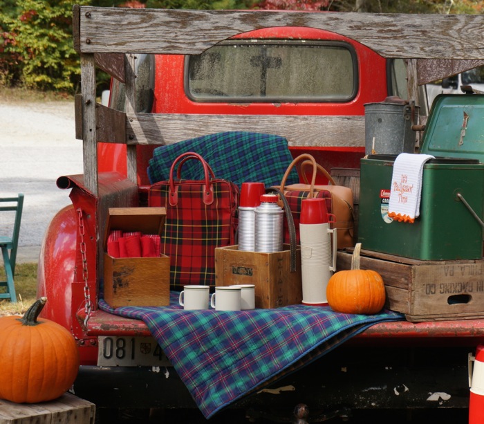 Rear view of vintage tailgate with Thermos coolers photo by Kathy Miller