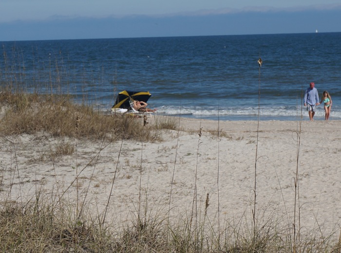 Iowa fan relaxes on beach at Amelia Island Omni photo by Kathy Miller