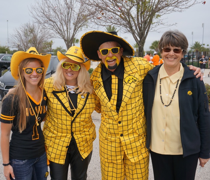 Sue joins her Hawkeye buddies photo by Kathy Miller