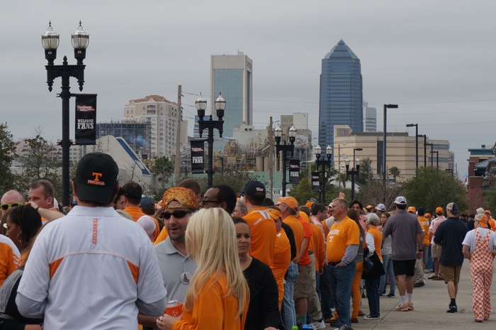 fans wait for Tennessee Vol Walk with Jacksonville skyline in background photo by Kathy Miller