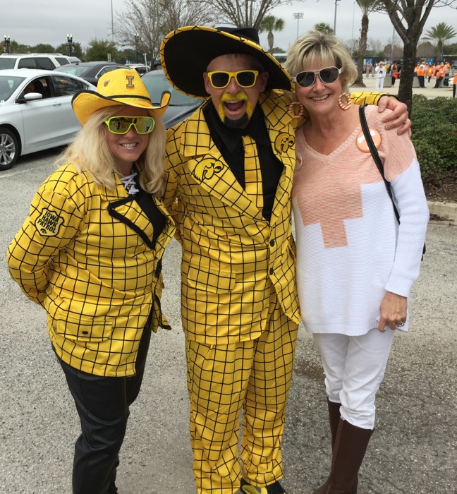 Kathy with some funky Iowa fans photo by Kathy Miller