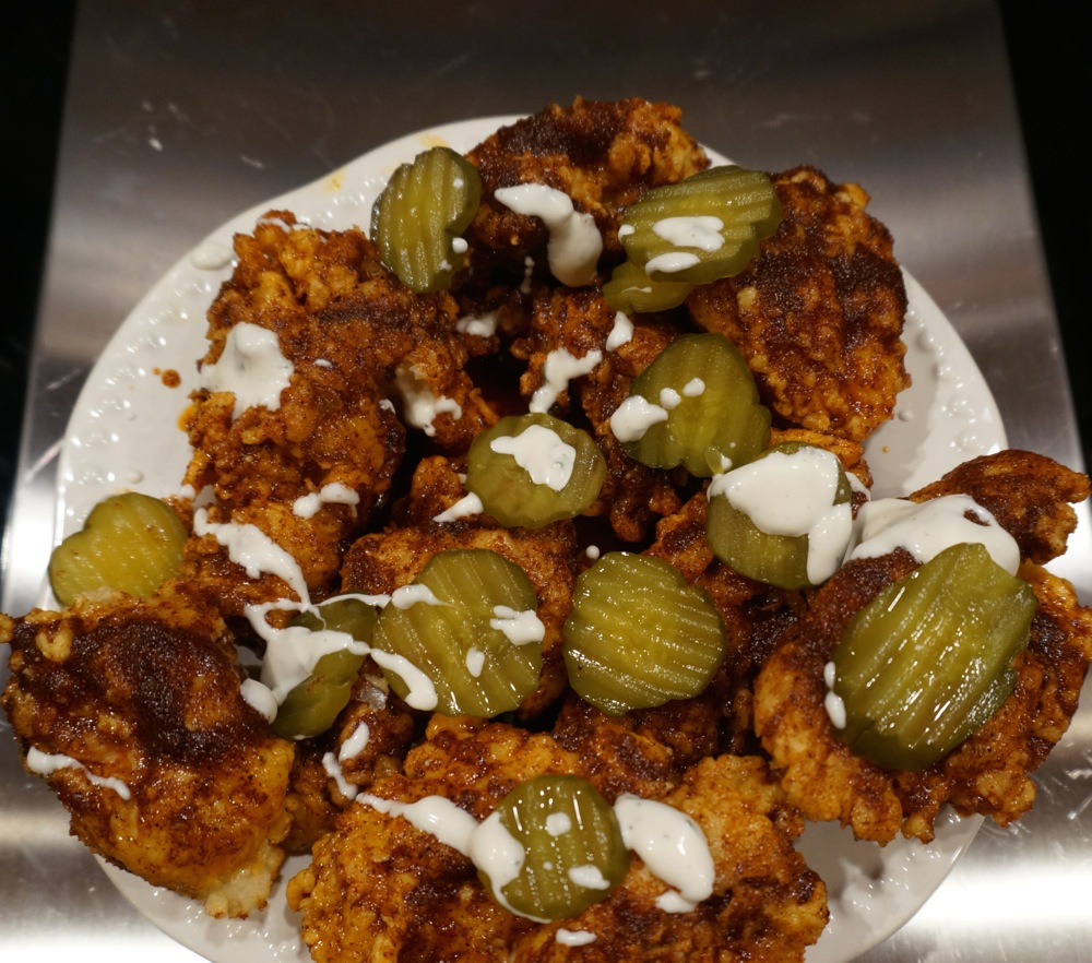 Chicken coated in spice, drizzled with Ranch and Frank's Red Hot Sauce and Dill Pickle photo by Kathy Miller