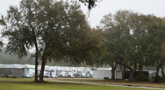 Semis delivering classic cars for Amelia Island Concours D'Elegance  photo by Kathy Miller