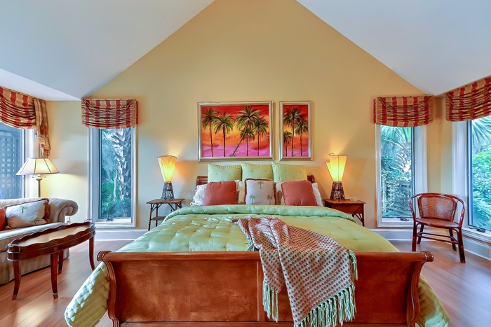 Master bedroom with artwork by Georganna Mullis