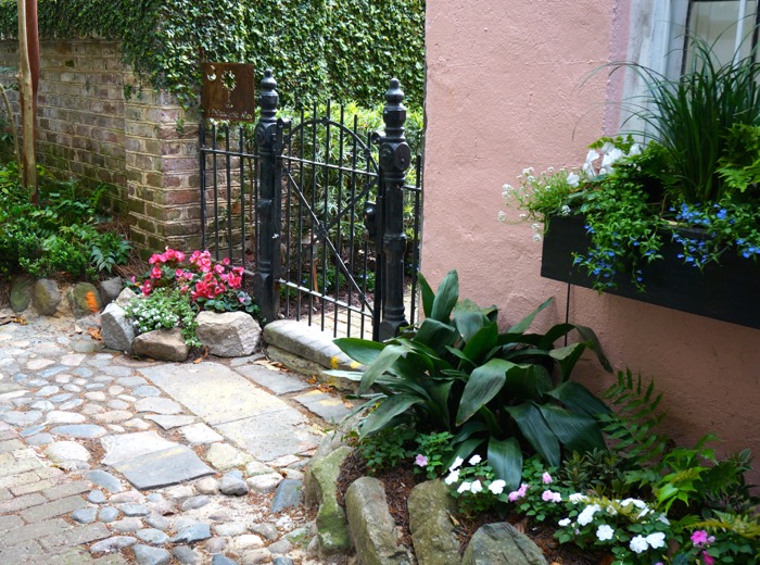 Side garden with iron gate Philadelphia Alley, Charleston, SC photo by Kathy Miller