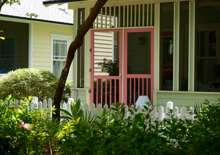 Cute back porch with pink doors photo by Kathy Miller