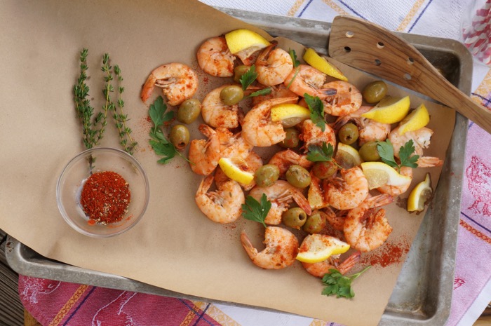 Shrimp boil with green olives and lemon photo by Kathy Miller