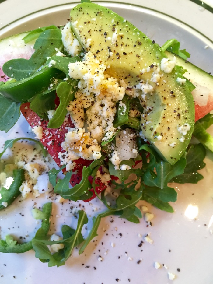 Watermelon wedge with arugula, jalapeno and white Stilton with Mango & Ginger cheese photo by Kathy Miller