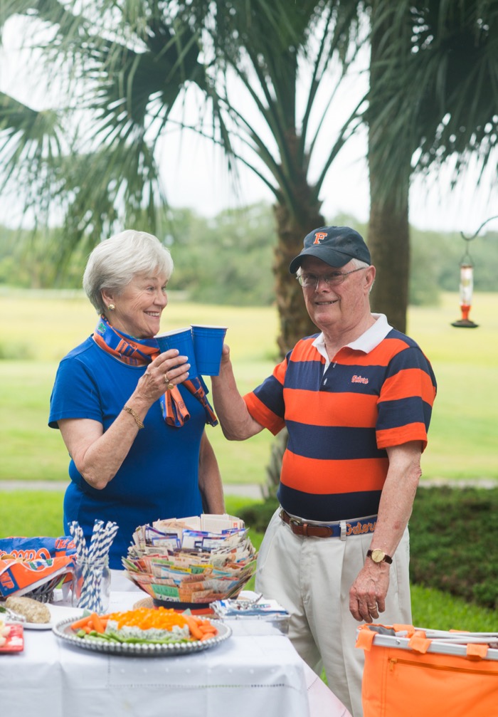Judy and Charlie Pillans toast the Gators photo by Page Teahan