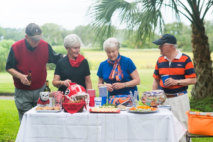 Bowles and Pillans celebrate FL/GA game tailgate photo by Page Teahan