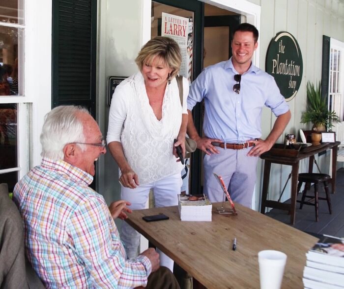 Kathy and James visiting with Loran Smith at The Plantation Shop