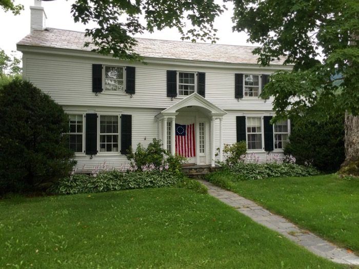 Dorset VT house with flag on door photo by Kathy Miller
